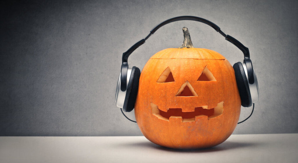 Pumpkin with headphones on